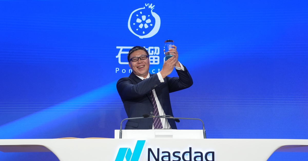 Zhenyang Shi, chairman and CEO of PomDoctor, rings the opening bell following their company's Nasdaq debut Zhenyang Shi, chairman and CEO of PomDoctor, rings the opening bell following their company's Nasdaq debut