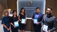 Representatives of NTU Singapore spin-off Gray Matter Solutions and Osler Group showing the application-based early dementia detection tool Representatives of NTU Singapore spin-off Gray Matter Solutions and Osler Group showing the application-based early dementia detection tool