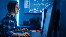 Person reviewing data on a PC Person reviewing data on a PC