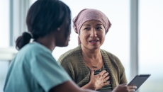 Healthcare professional talking to a patient Healthcare professional talking to a patient