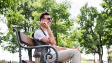 Man using a smartphone Man using a smartphone