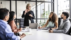 Executives in a meeting  Executives in a meeting