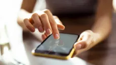 Person using smartphone Person using smartphone