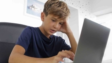 Person working on a laptop Person working on a laptop