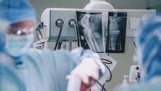 Surgeons doing operation in hospital operating room Surgeons doing operation in hospital operating room