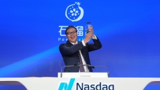 Zhenyang Shi, chairman and CEO of PomDoctor, rings the opening bell following their company's Nasdaq debut Zhenyang Shi, chairman and CEO of PomDoctor, rings the opening bell following their company's Nasdaq debut