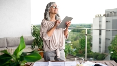 woman reviewing health information on a tablet woman reviewing health information on a tablet