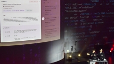 PhnyX representatives demonstrating the genAI chatbot Cheiron PhnyX representatives demonstrating the genAI chatbot Cheiron