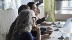 People sitting around a table People sitting around a table
