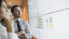 Executives reviewing data