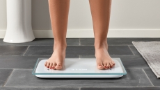 A person standing on the Cardiac Scale. A person standing on the Cardiac Scale.