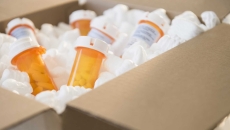 Prescription drug bottles in a box Prescription drug bottles in a box