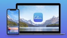 The Calm app on a phone and a laptop The Calm app on a phone and a laptop