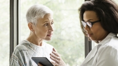 Healthcare professional consulting with patient Healthcare professional consulting with patient