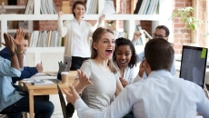 A group of teenagers gathered in a room A group of teenagers gathered in a room