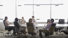 Executives meeting in a conference room Executives meeting in a conference room