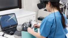 A person using the FundamentalVR platform for surgery training. A person using the FundamentalVR platform for surgery training.