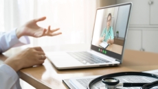 Person talking to a telehealth provider Person talking to a telehealth provider