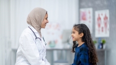 Two people sitting and discussing Two people sitting and discussing