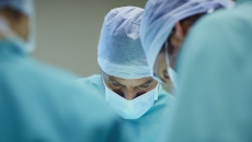 Surgeons performing an operation Surgeons performing an operation