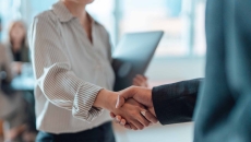 Two people shaking hands Two people shaking hands