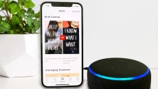 A smartphone displaying the Nurx app next to an Amazon Echo device A smartphone displaying the Nurx app next to an Amazon Echo device