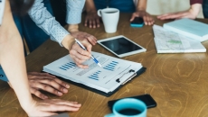 Executives reviewing data Executives reviewing data