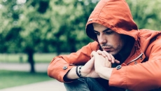 Person sitting in a park Person sitting in a park