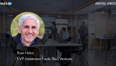 Ryan Helon at Rev1 Ventures_Business presentation in meeting room by simonkr/Getty Images