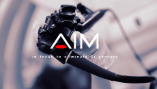 AI Medical Service's logo over an endoscope