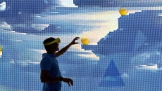 Silhouette of man interacting with a virtual environment while wearing a VR headset Silhouette of man interacting with a virtual environment while wearing a VR headset