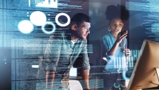 Two programmers working on code at night Two programmers working on code at night