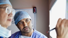 Doctors looking at imaging results Doctors looking at imaging results