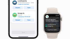 An Apple Watch and an iPhone displaying the medication tracking feature An Apple Watch and an iPhone displaying the medication tracking feature