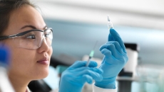 A researcher working in a lab A researcher working in a lab