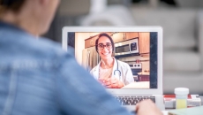 A telemedicine visit via tablet A telemedicine visit via tablet