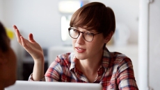 Person looking at open laptop Person looking at open laptop