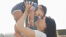 A person holding a baby A person holding a baby