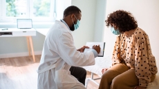 A woman talking to her doctor A woman talking to her doctor