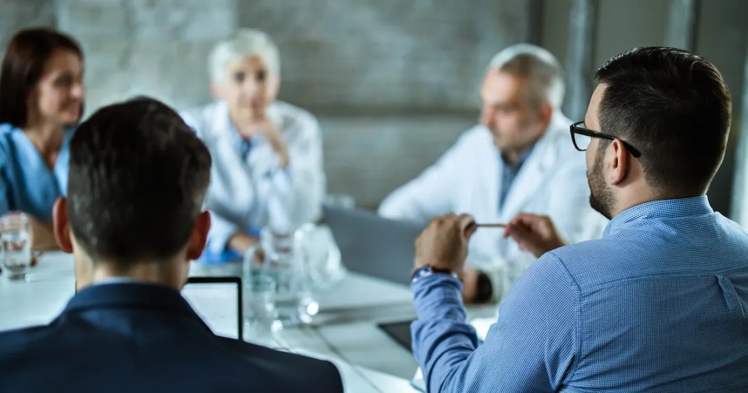 Professional staff in conference Professional staff in conference