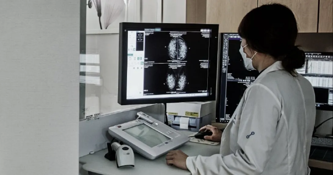 Doctor reviewing mammography findings from AI-powered software Doctor reviewing mammography findings from AI-powered software