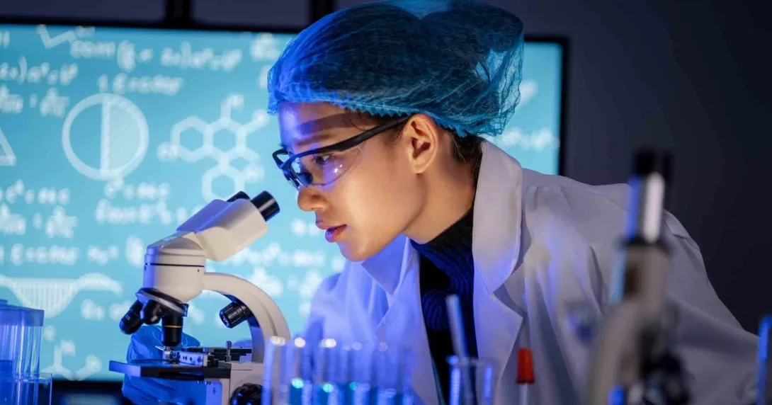 Scientist conducting experiments in a laboratory Scientist conducting experiments in a laboratory