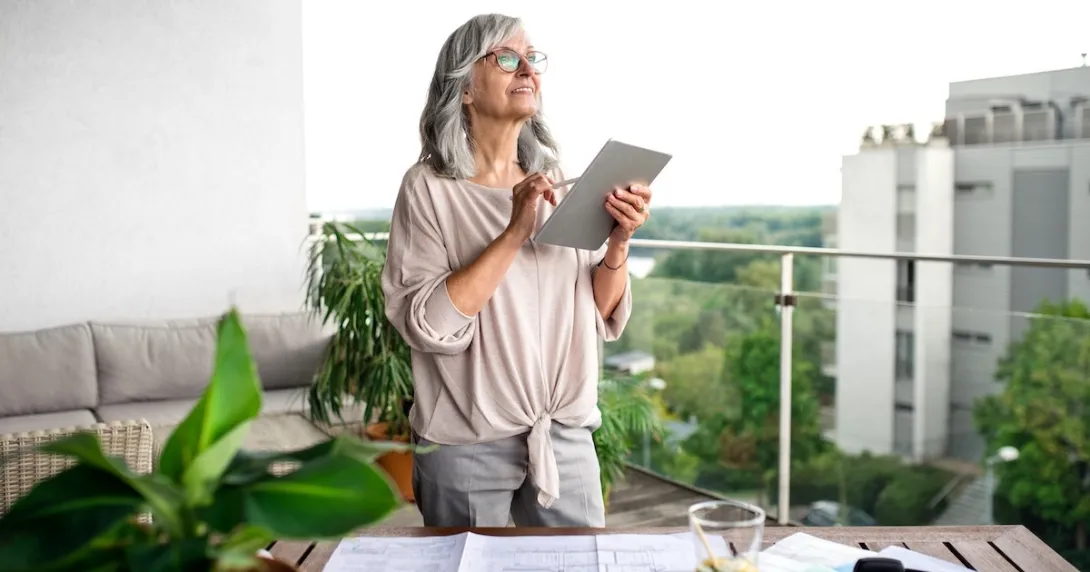 woman reviewing health information on a tablet woman reviewing health information on a tablet