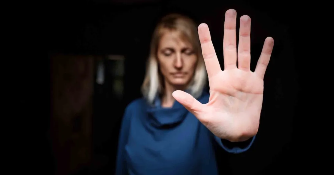 Person showing stop sign with hand Person showing stop sign with hand