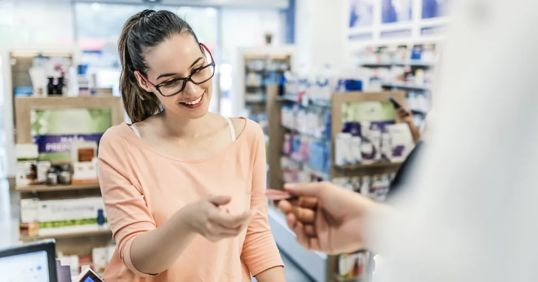 Woman interacting with a pharmacist Woman interacting with a pharmacist
