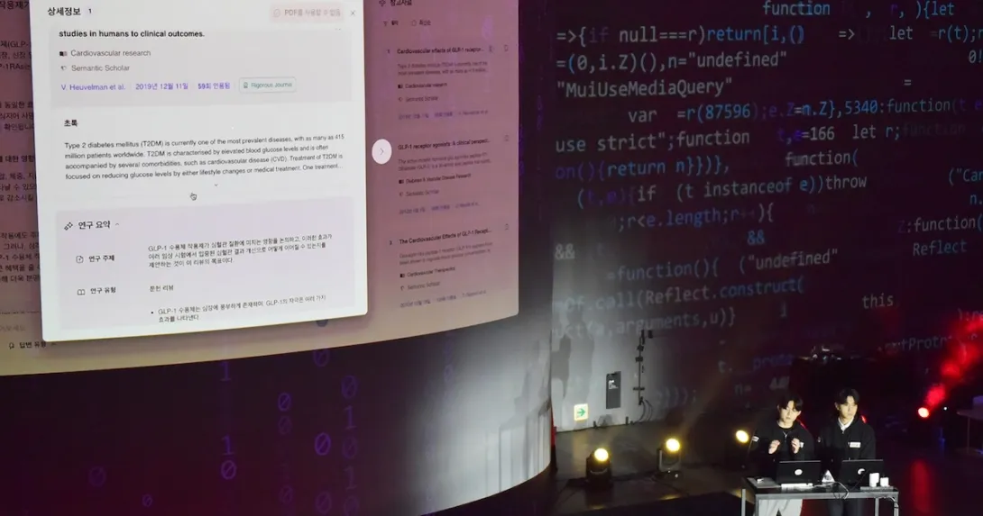 PhnyX representatives demonstrating the genAI chatbot Cheiron PhnyX representatives demonstrating the genAI chatbot Cheiron