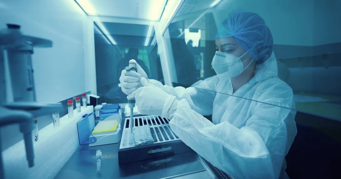 Technician working in a lab Technician working in a lab