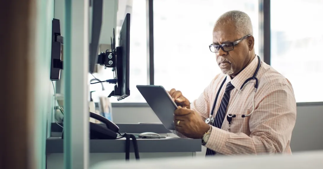 Physician using a tablet Physician using a tablet