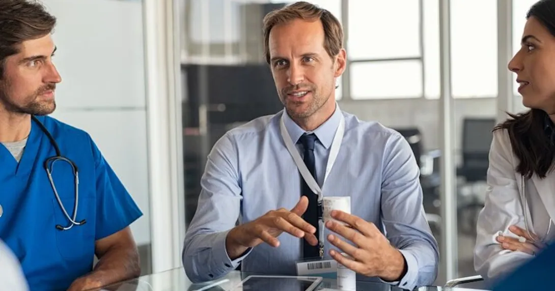 Clinician consulting with colleagues Clinician consulting with colleagues