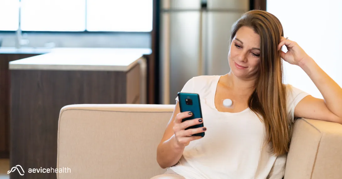 A person wearing the AeviceMD wearable stethoscope A person wearing the AeviceMD wearable stethoscope